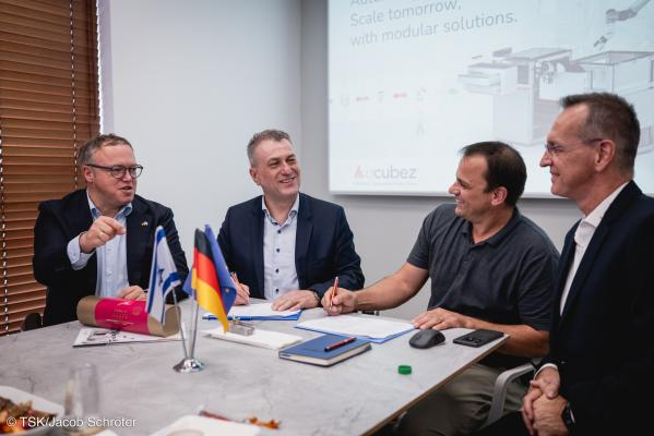 Meeting at a table with four peolpe